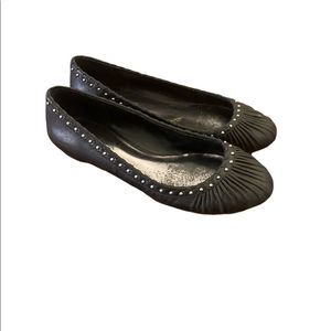 Size 7 Black INC Flats with Silver Hardware Around the Outside